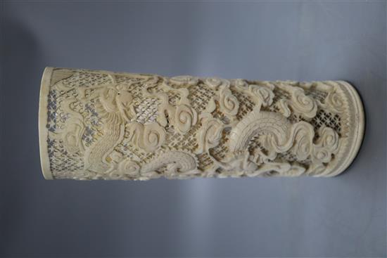 A pierced ivory dragon brush pot, height 21cm